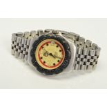 TAG HEUER FORMULA 1 PROFESSIONAL MID-SIZED QUARTZ WRISTWATCH, yellowed dial with black markers and a