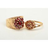 TWO GARNET RINGS, the first a 9ct gold ring designed as a garnet cluster to the wide tapered