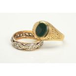 TWO RINGS, the first a bloodstone signet ring, ring size O, the second a paste eternity ring,