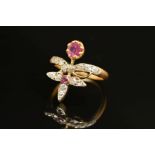 AN EARLY 20TH CENTURY RUBY AND DIAMOND FANCY ABSTRACT RING, a wishbone form supporting foliate