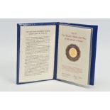 A GOLD PROOF REPUBLIC OF PANAMA 100 BALBOA COIN 1975, presented in its original sealed wallet,