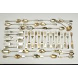 A PARCEL OF MATCHED WILLIAM IV AND VICTORIAN SILVER FIDDLE PATTERN FLATWARE, various makers and