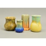 FOUR RUSKIN POTTERY VASES, comprising a yellow and green example, impressed marks to base, height