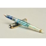 A MONT BLANC 24 DEMONSTRATION FOUNTAIN PEN, transparent casing with gold plated clip and cap trim,