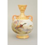A ROYAL WORCESTER TWIN HANDLED VASE PAINTED WITH MALLARD DUCKS IN FLIGHT BY JAMES STINTON, blush