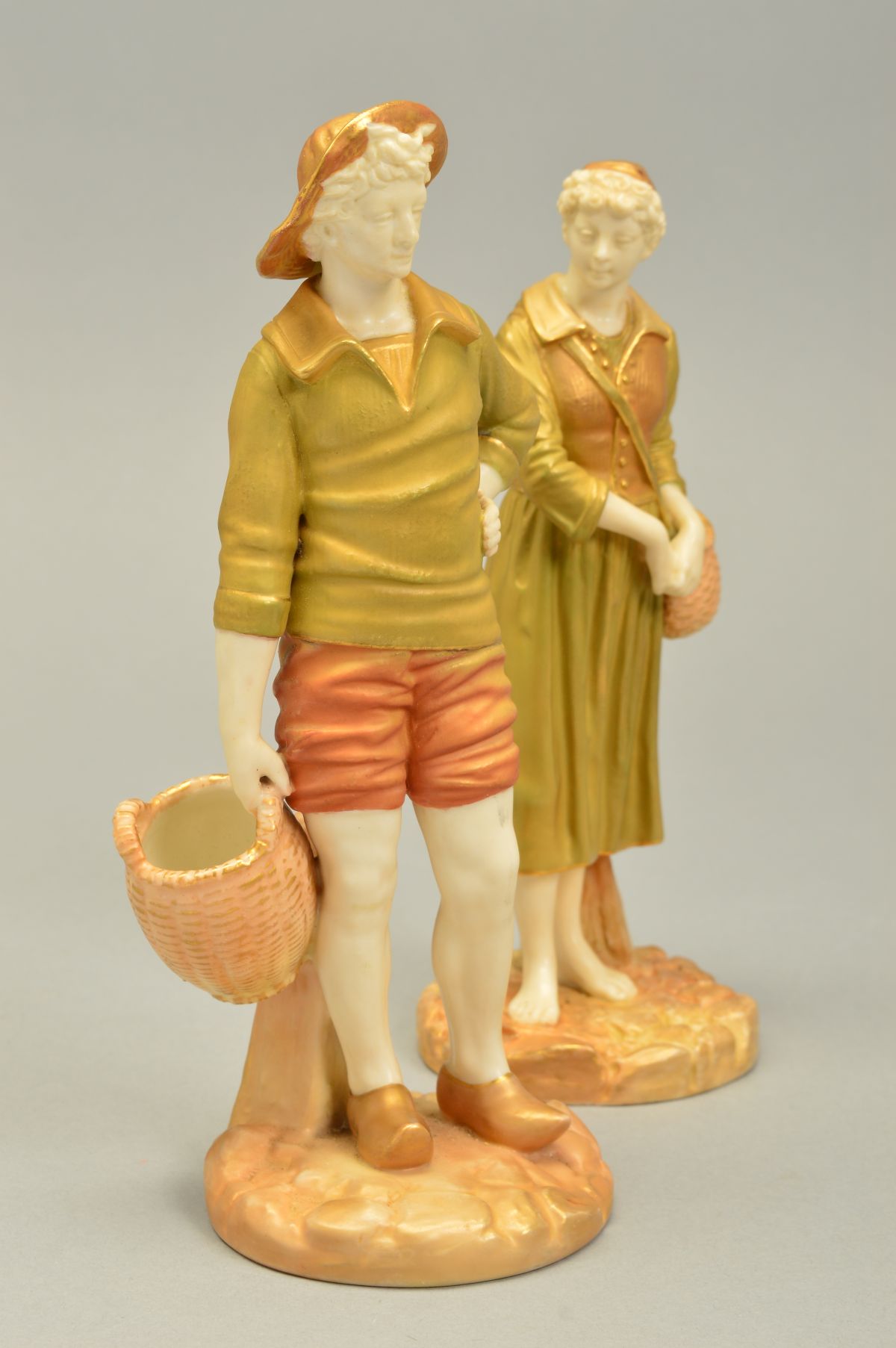 A PAIR OF ROYAL WORCESTER FIGURES OF FRENCH FISHERMAN AND WOMAN, model No.1202 to both, ivory skin - Image 2 of 5