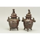 TWO LATE 19TH CENTURY JAPANESE BRONZE KORO AND COVERS, differing designs, the similar covers with