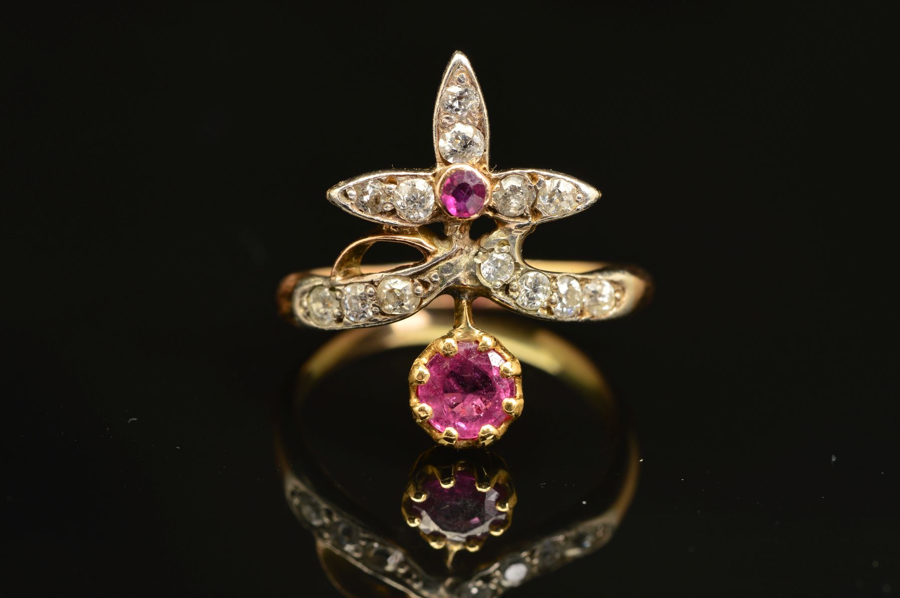 AN EARLY 20TH CENTURY RUBY AND DIAMOND FANCY ABSTRACT RING, a wishbone form supporting foliate - Image 4 of 7