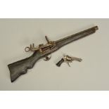 A SMALL 5MM PIN-FIRE REVOLVER, bearing no maker's name, it is overall machine engraved, including