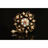 AN EDWARDIAN GOLD, OPAL, RUBY AND PEARL PENDANT, circular open work design, measuring