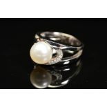 A MODERN 18CT WHITE GOLD, CULTURED PEARL AND DIAMOND RING, a white cultured pearl measuring