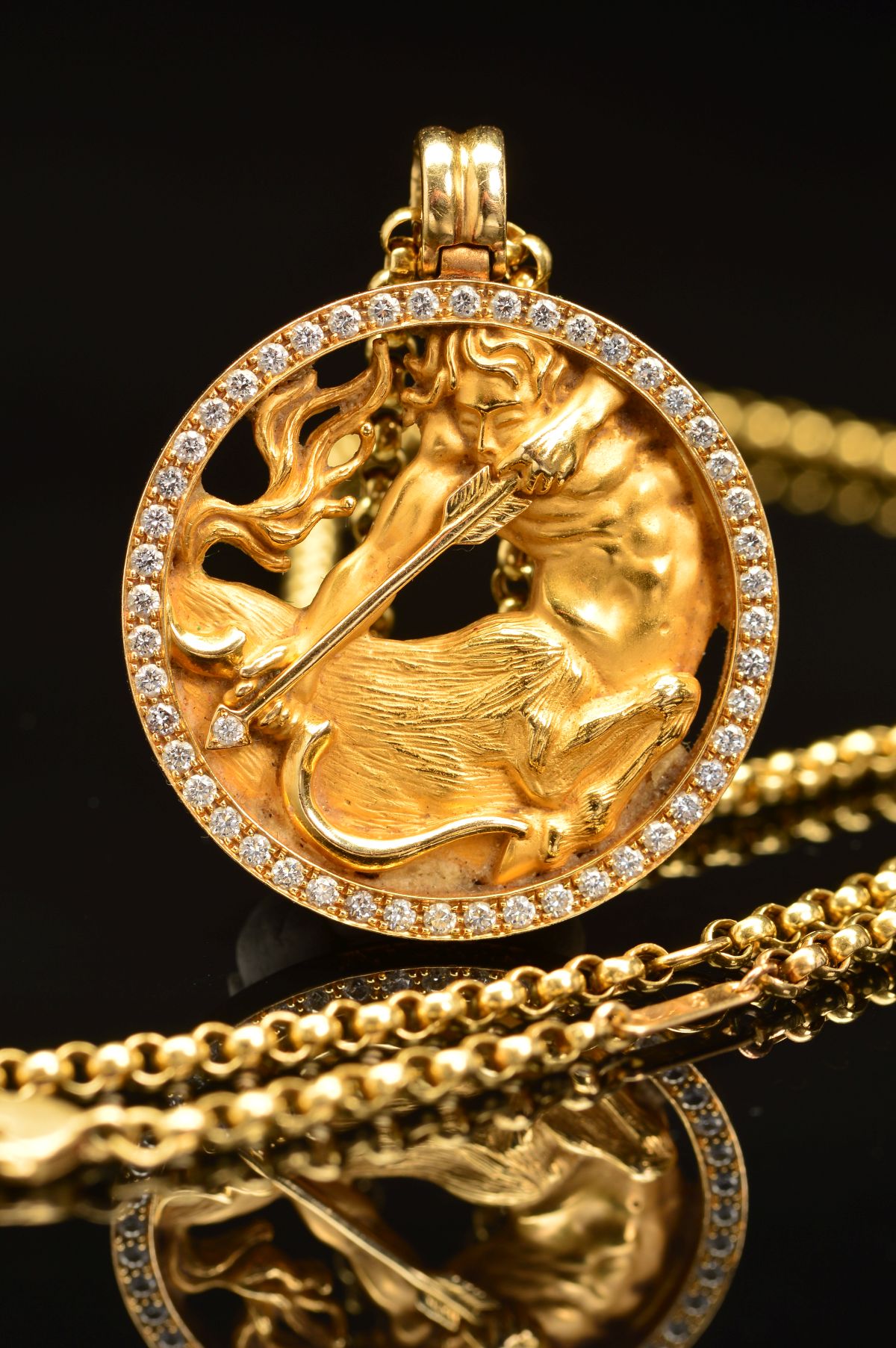 A MAGERIT DIAMOND SET SAGITTARIUS PENDANT AND CHAIN, the circular pendant depicting a centaur with - Image 3 of 6