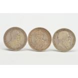THREE CROWN SIZE SILVER COINS, to include a Cyprus 1928 45 piastres coin in E.F condition, two