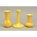THREE PIECES OF RUSKIN POTTERY, comprising a candlestick, impressed Ruskin 1918 to the base,