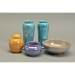 THREE PIECES OF RUSKIN POTTERY, comprising a small peach lustre ginger jar with damaged lid,