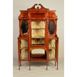AN EDWARDIAN MAHOGANY AND SATINWOOD INLAID DISPLAY CABINET, the detachable broken swan neck pediment