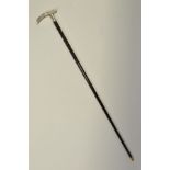 A LATE 19TH / EARLY 20TH CENTURY CHINESE HARDWOOD WALKING CANE WITH SILVER HANDLE, the handle with