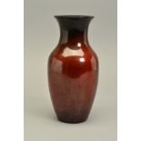 A PILKINGTON LANCASTRIAN BALUSTER VASE, decorated in a brown treacle metallic glaze fading to