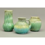 THREE PIECES OF RUSKIN POTTERY, comprising a decorative single handled jug, impressed triangular