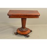 AN EARLY VICTORIAN ROSEWOOD FOLDOVER CARD TABLE, with rounded corners, circular green baize lined