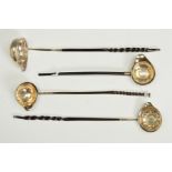 THREE 18TH CENTURY WHITE METAL COIN SET TODDY LADLES, all on twisted whale bone handles, two with