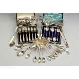 A GROUP OF SILVER, to include cased and loose flatware, two vesta cases, three napkin rings, card