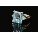 A MODERN LARGE AQUAMARINE AND DIAMOND RING, aquamarine measuring approximately 14.4mm x 12.9mm x 9.