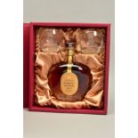 A BOTTLE OF CHATEAU DE LAUBADE XO BAS-ARMAGNAC, in a presentation box with two glasses