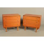 A PAIR OF 1970'S TEAK CHESTS OF THREE GRADUATING DRAWERS, with sloped handles, width 76cm x depth