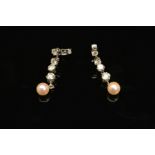 A PAIR OF MODERN DIAMOND AND CULTURED PEARL DROP EARRINGS, measuring approximately 28mm in length,