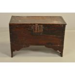 A LATE 17TH CENTURY AND LATER BOARDED OAK CHEST, the rectangular hinged top with iron hasp and lock,