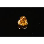 A LOOSE FANCY COLOURED DIAMOND, a modern modified heart shape, fancy intense yellow diamond,
