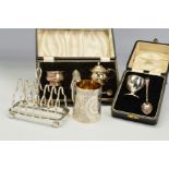 A SMALL PARCEL OF SILVER, comprising a late Victorian silver christening mug of conical form, gilt