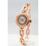AN EARLY 20TH CENTURY 9CT ROSE GOLD LADIES WRISTWATCH, round case measuring approximately 28mm in