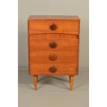A 1970'S TALL TEAK CHEST OF FOUR GRADUATING DRAWERS, with large circular handles, on square tapering