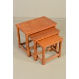 ROBERT THOMPSON OF KILBURN MOUSEMAN OAK RECTANGULAR NEST OF THREE ADZED TOP TABLES, on octagonal and