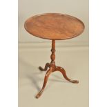 A GEORGE III MAHOGANY CIRCULAR TRAY TILT TOP TRIPOD TABLE, on a slender cylindrical and baluster