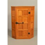 ROBERT THOMPSON OF KILBURN MOUSEMAN OAK WALL HANGING CORNER CUPBOARD, the four panel sides