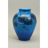 A PILKINGTON'S ROYAL LANCASTRIAN LOBED BALUSTER VASE, having a blue mottled ground with raised