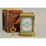 A LATE 19TH CENTURY GILT BRASS AND PORCELAIN CASED CARRIAGE CLOCK, with alarm and push button repeat