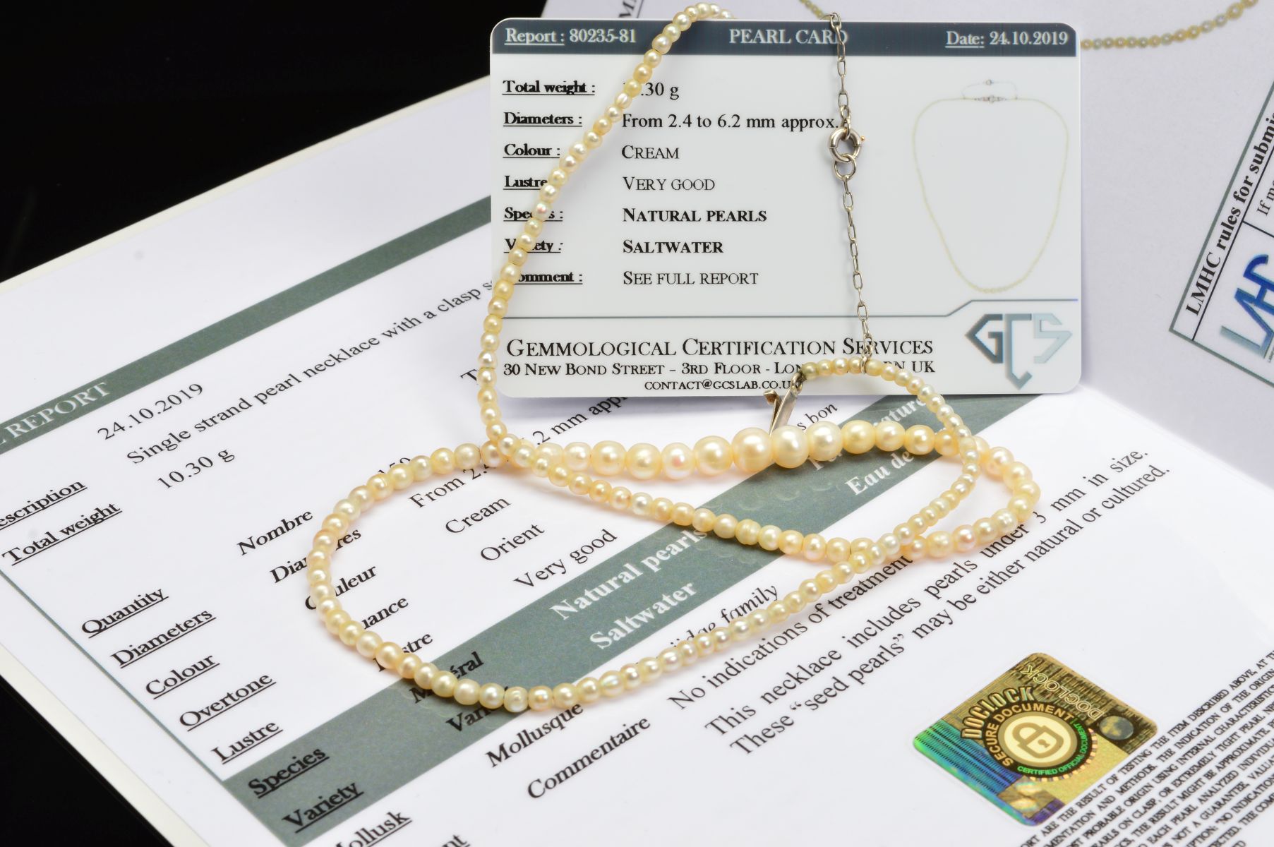 AN EARLY 20TH CENTURY NATURAL SALTWATER PEARL GRADUATED SINGLE ROW PEARL NECKLACE, accompanied by - Image 7 of 7