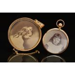 TWO PICTURE PENDANTS, measuring approximately 33mm and 42mm in diameter, the smaller hallmarked