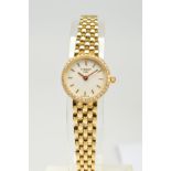 A MODERN 18CT GOLD AND DIAMOND LADIES TISSOT WRISTWATCH, round white dial measuring approximately