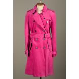 A PINK SUEDE BURBERRY TRENCH COAT, with lapel collar, waist belt with black leather buckle, black