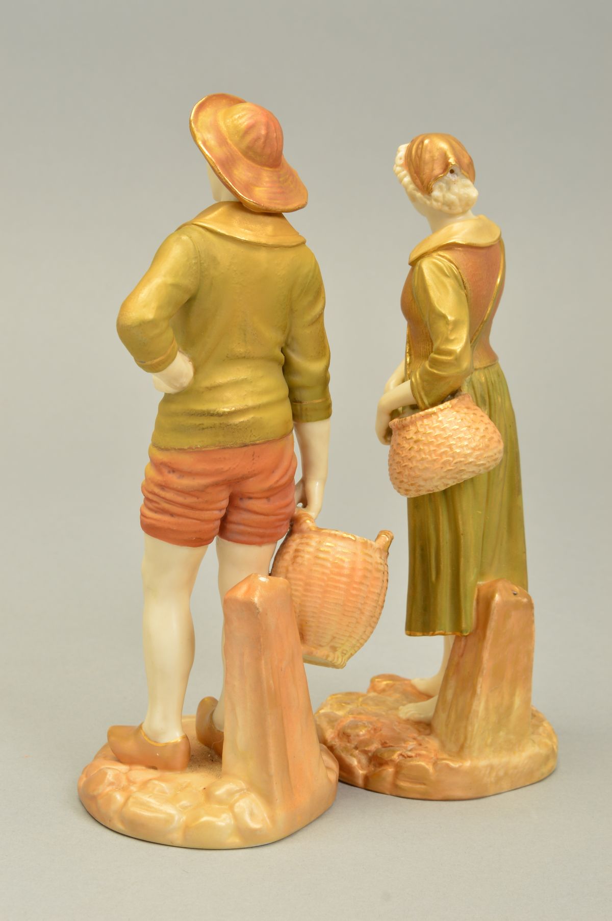 A PAIR OF ROYAL WORCESTER FIGURES OF FRENCH FISHERMAN AND WOMAN, model No.1202 to both, ivory skin - Image 4 of 5