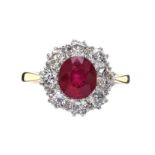 18CT GOLD RUBY AND DIAMOND CLUSTER RING