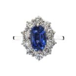 18CT WHITE GOLD SAPPHIRE AND DIAMOND CLUSTER RING