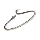 18CT WHITE GOLD DIAMOND TENNIS BRACELET