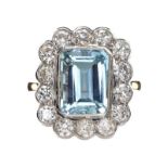 18CT GOLD AQUAMARINE AND DIAMOND RING