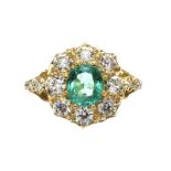 18CT GOLD EMERALD AND DIAMOND CLUSTER RING